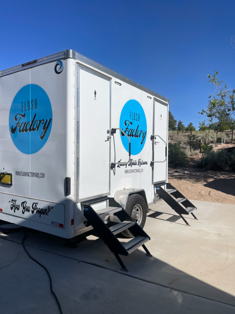Close-up of Flush Factory restroom trailer doors and steps