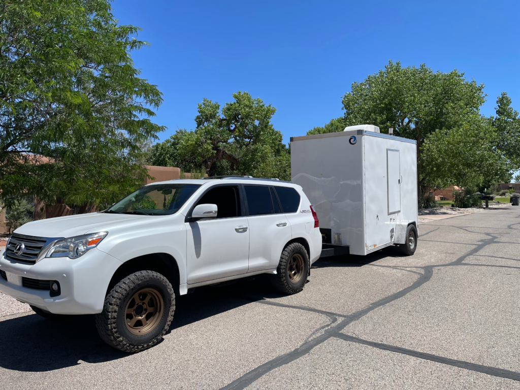 Flush Factory restroom trailer being towed for delivery