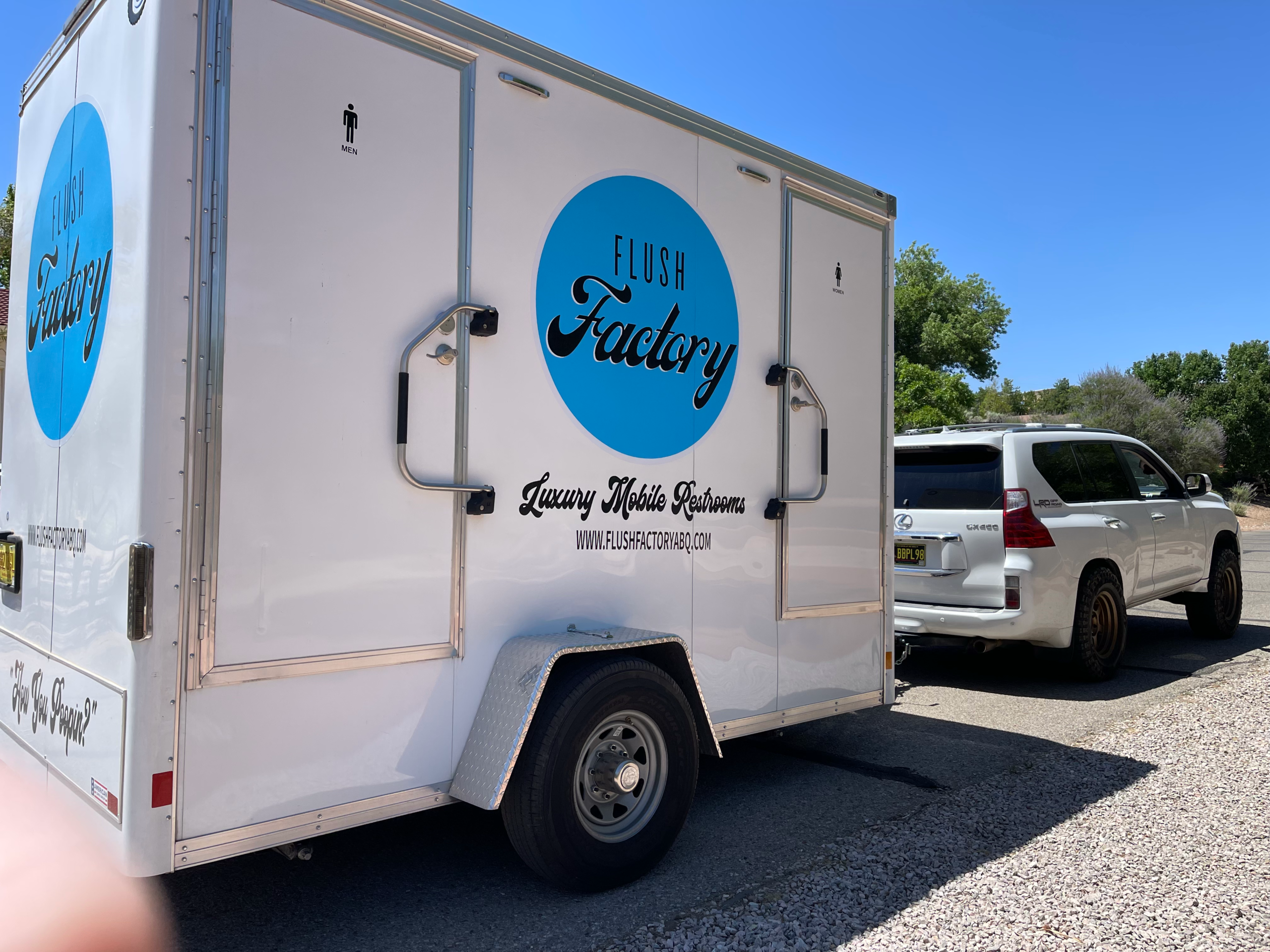 Side view of the Flush Factory luxury restroom trailer