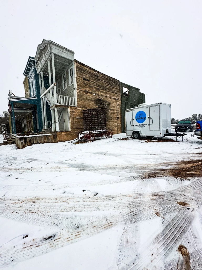 Restroom trailer delivered to a snowy off-grid site in New Mexico